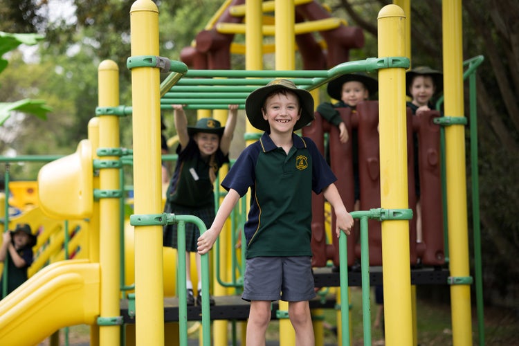 students-on-bright-coloured-play-equipment
