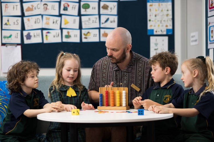 four-students-doing-maths-with-mr-lowe